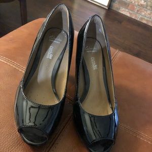 Clark’s size 6.5 black patent leather peep toe.